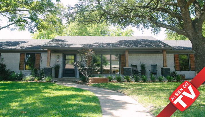 A single-story brick house with a front porch, rocking chairs, and a walkway in McLennan County, Texas.