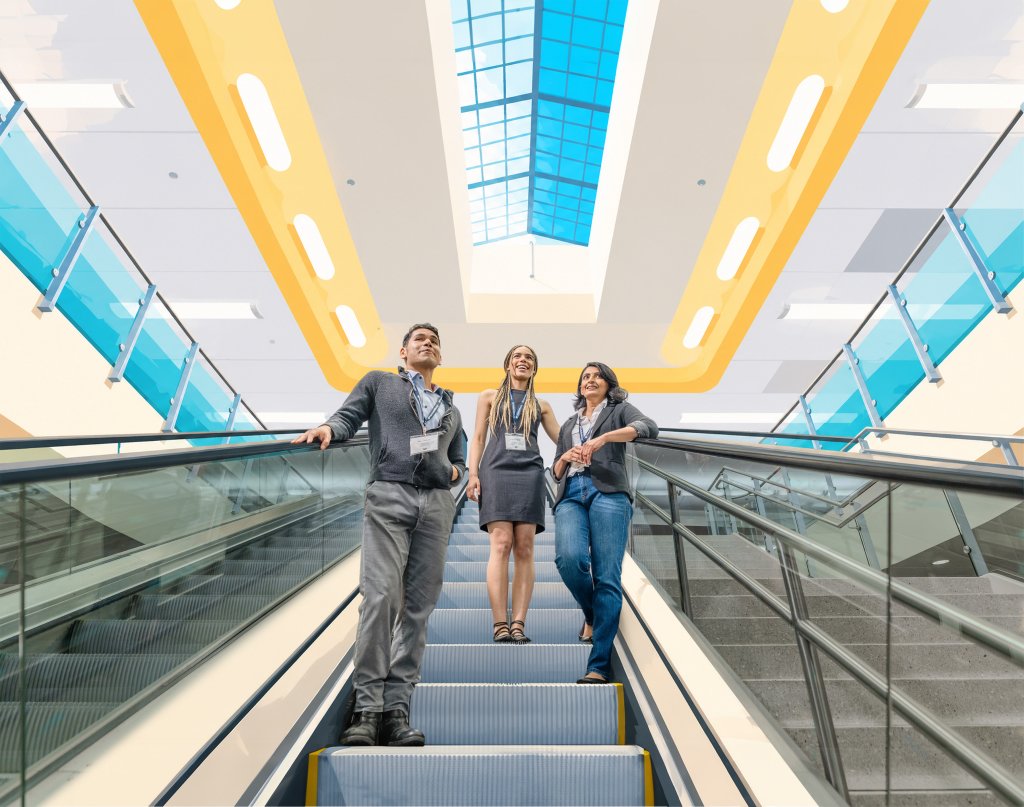 Three people riding an escalator in a modern building with a skylight in McLennan County, Texas.