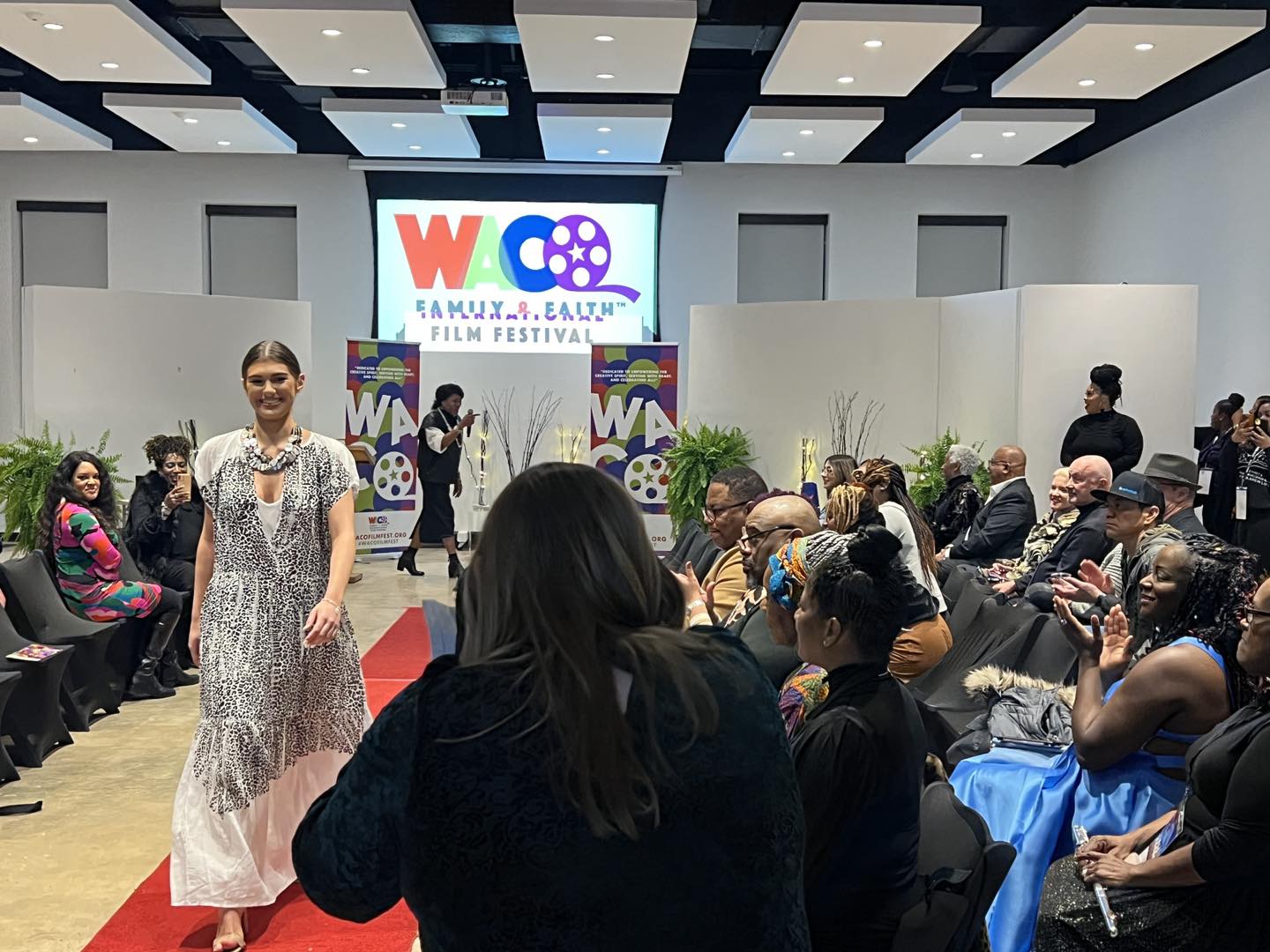 A model walks down a runway at the Waco Family and Faith Film Festival in McLennan County, Texas.