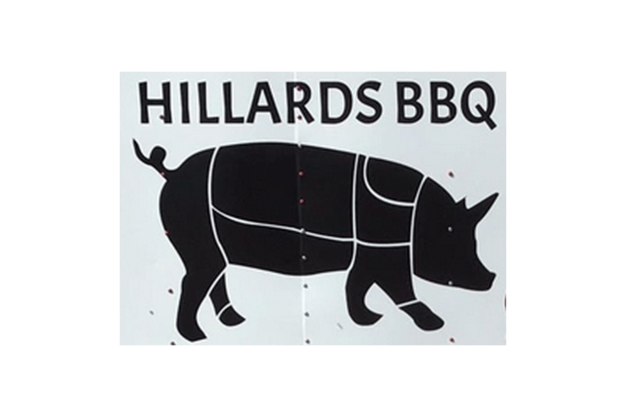 A sign for Hillards BBQ featuring a black silhouette of a pig with butcher cuts in McLennan County, Texas.