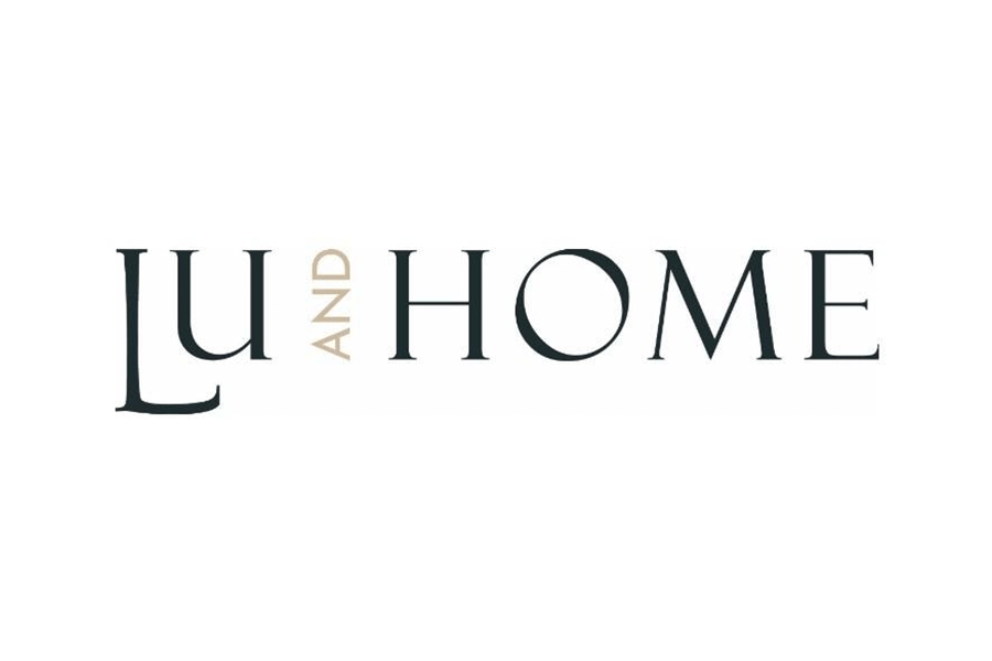 The text LU AND HOME written in a serif font on a white background in McLennan County, Texas.