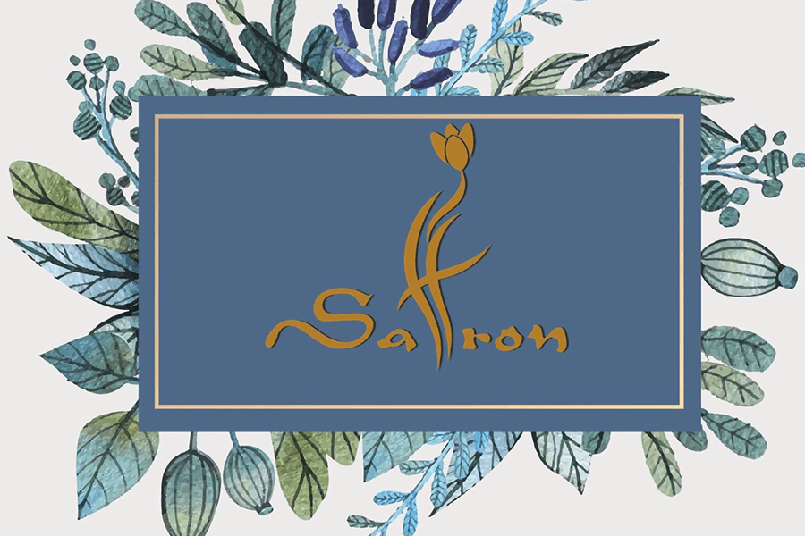 A logo with the word Saffron in gold, surrounded by a watercolor floral frame in McLennan County, Texas.