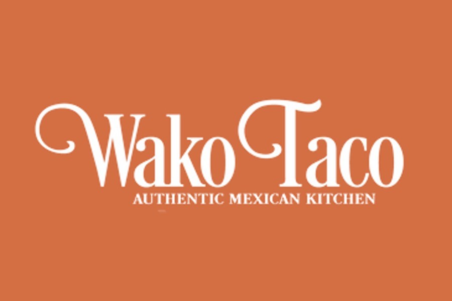 The logo for Wako Taco Authentic Mexican Kitchen on an orange background in McLennan County, Texas.