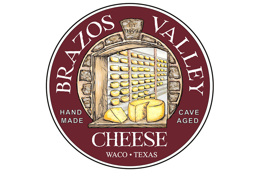 A circular logo for Brazos Valley Cheese featuring a drawing of cheese in a cave in McLennan County, Texas.
