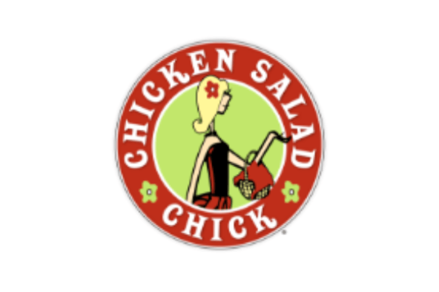 The circular logo for the restaurant chain Chicken Salad Chick featuring a stylized woman in McLennan County, Texas.