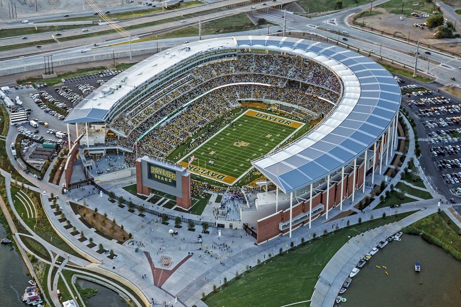 An aerial view of McLane Stadium filled with spectators during a football game in McLennan County, Texas.