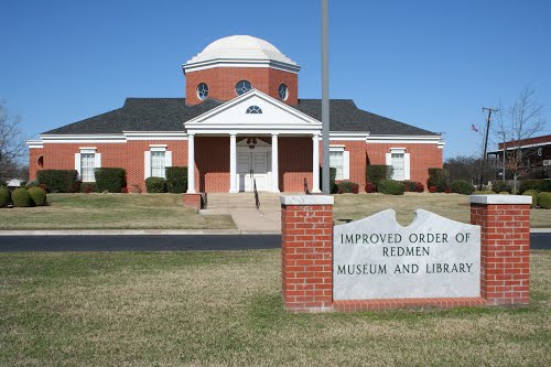 The Improved Order of Redmen Museum and Library building with a brick exterior in McLennan County, Texas.