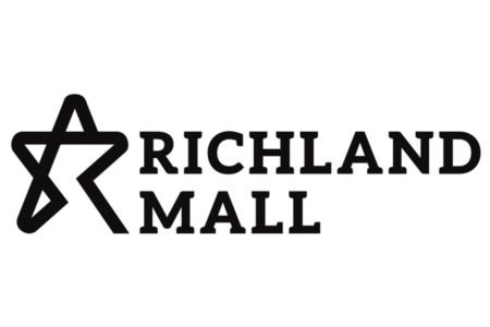The black logo for Richland Mall featuring a stylized star and text in McLennan County, Texas.