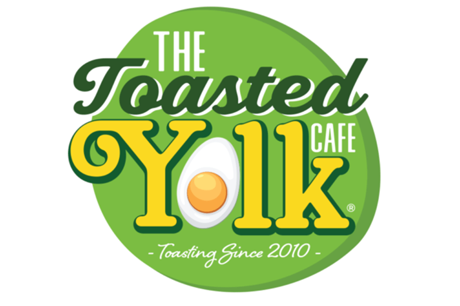 The logo for The Toasted Yolk Cafe featuring a stylized egg on a green circle in McLennan County, Texas.