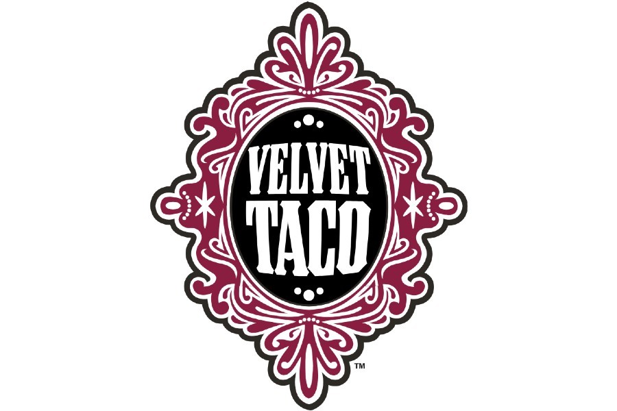 The Velvet Taco logo featuring white text inside a decorative maroon and black frame in McLennan County, Texas.