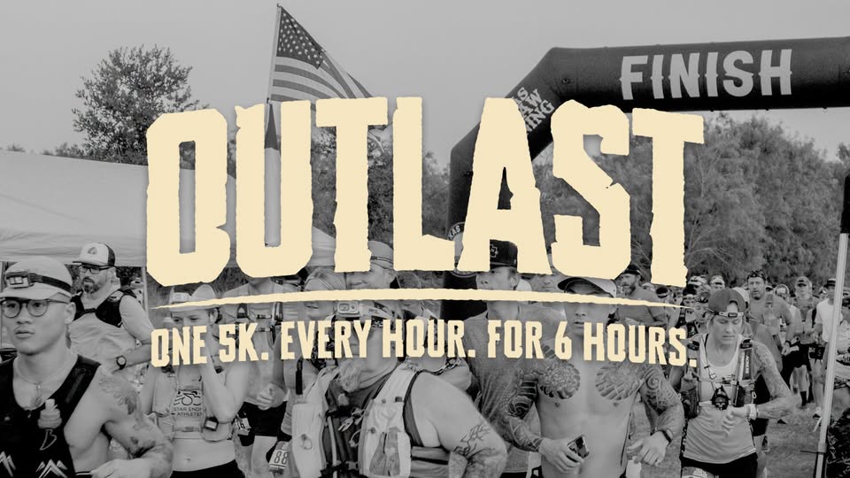 A group of runners participating in an endurance race event with a finish line arch in McLennan County, Texas.